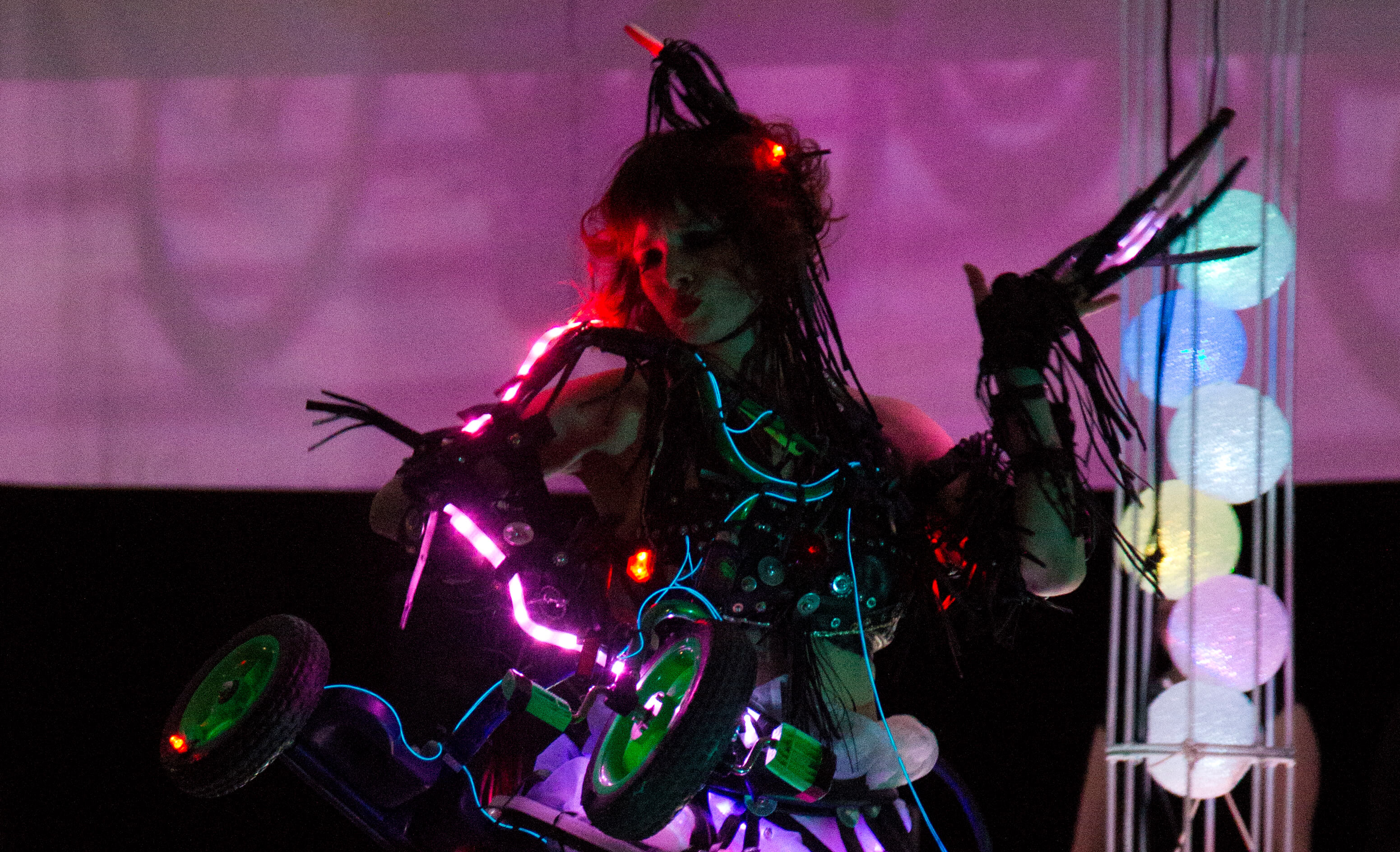 Fashion tech in action. Maya Lewandowsky performing; photo by Solarbotics.